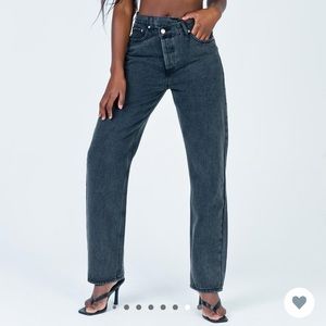 Black asymmetrical denim jeans